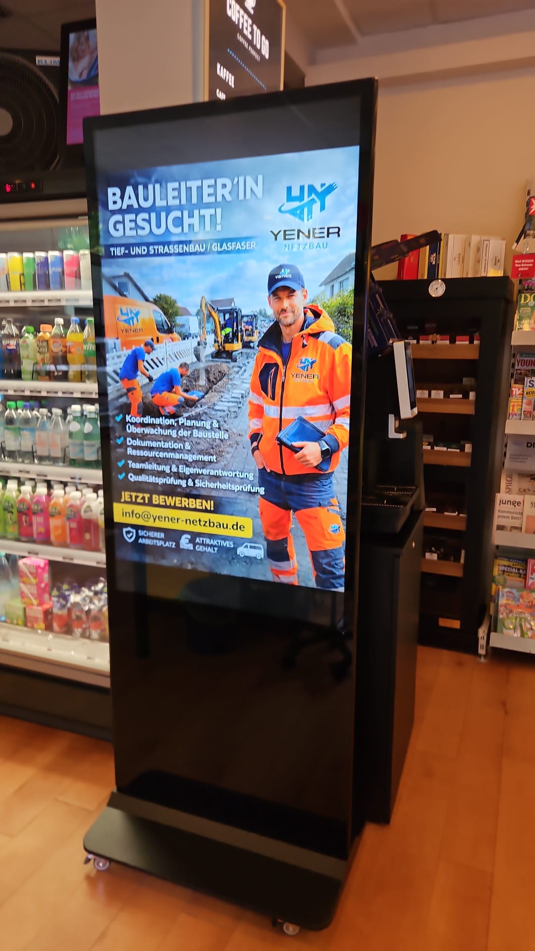 ClickClickPlay digital signage totem playing promotions inside a Berlin kiosk