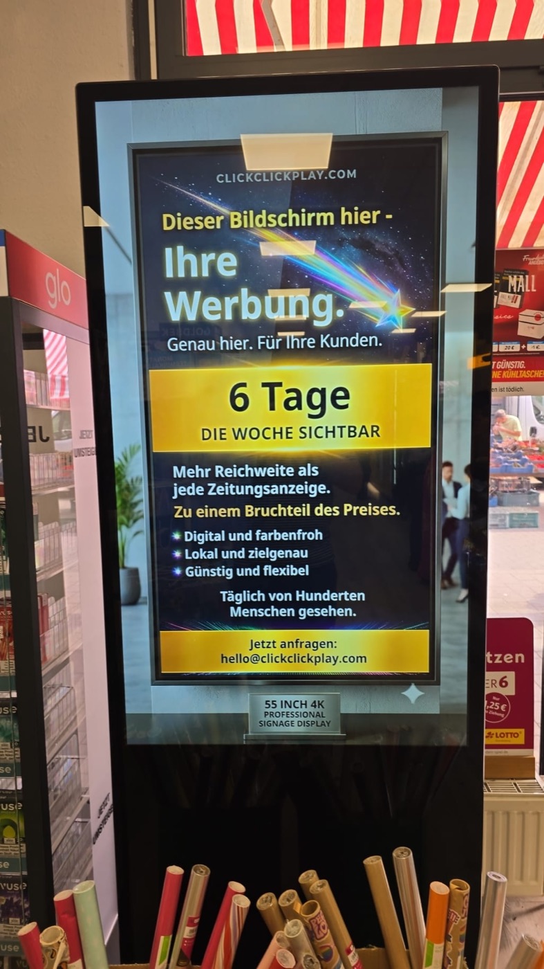 Berlin kiosk with an awning and a street-facing digital screen