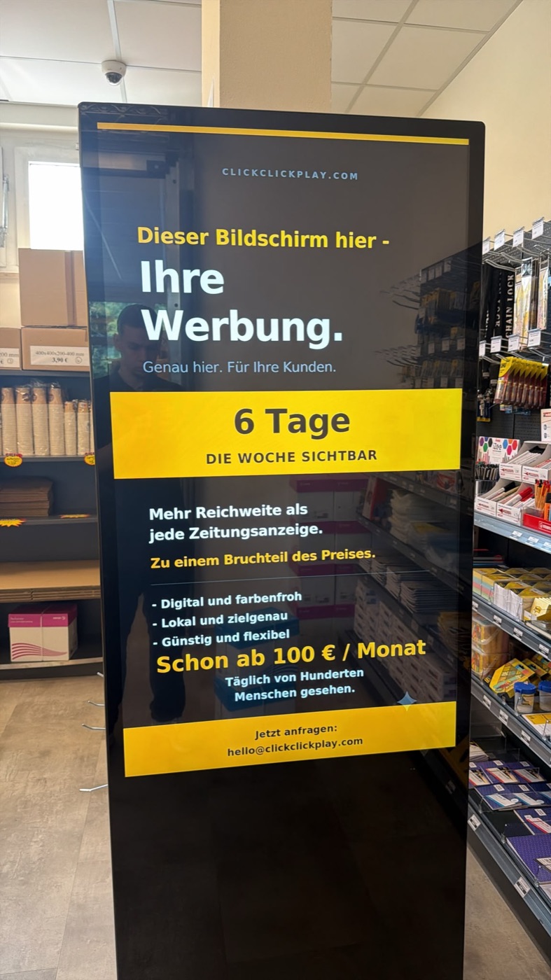 ClickClickPlay advertising screen at a kiosk shopfront